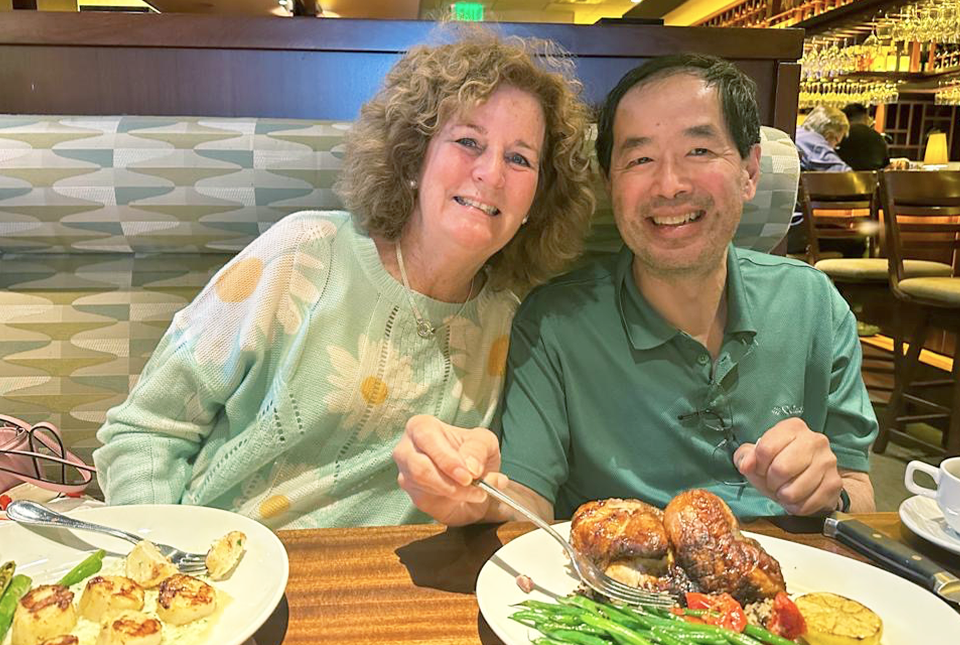 man and woman eating