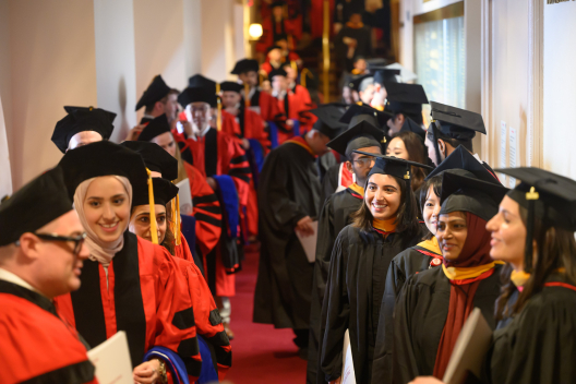 Students line both sides of a hallway