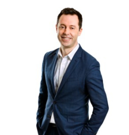 A man standing for a photo