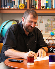 man sitting at table