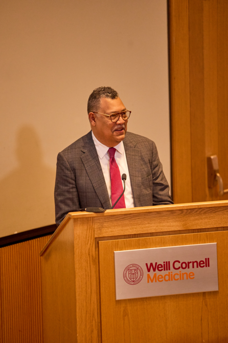 Man standing at a podium
