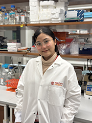 photo of a woman in a labcoat