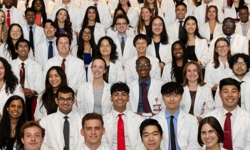 students at white coat ceremony