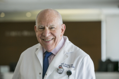 photo of a man in a white coat