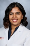 Headshot of Azmina Karukappadath